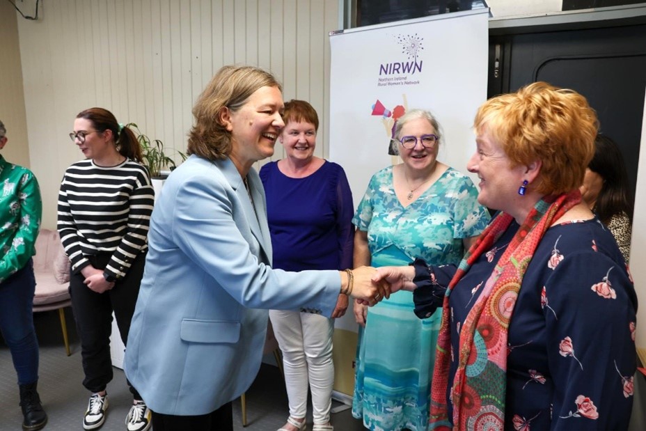 women shaking hands