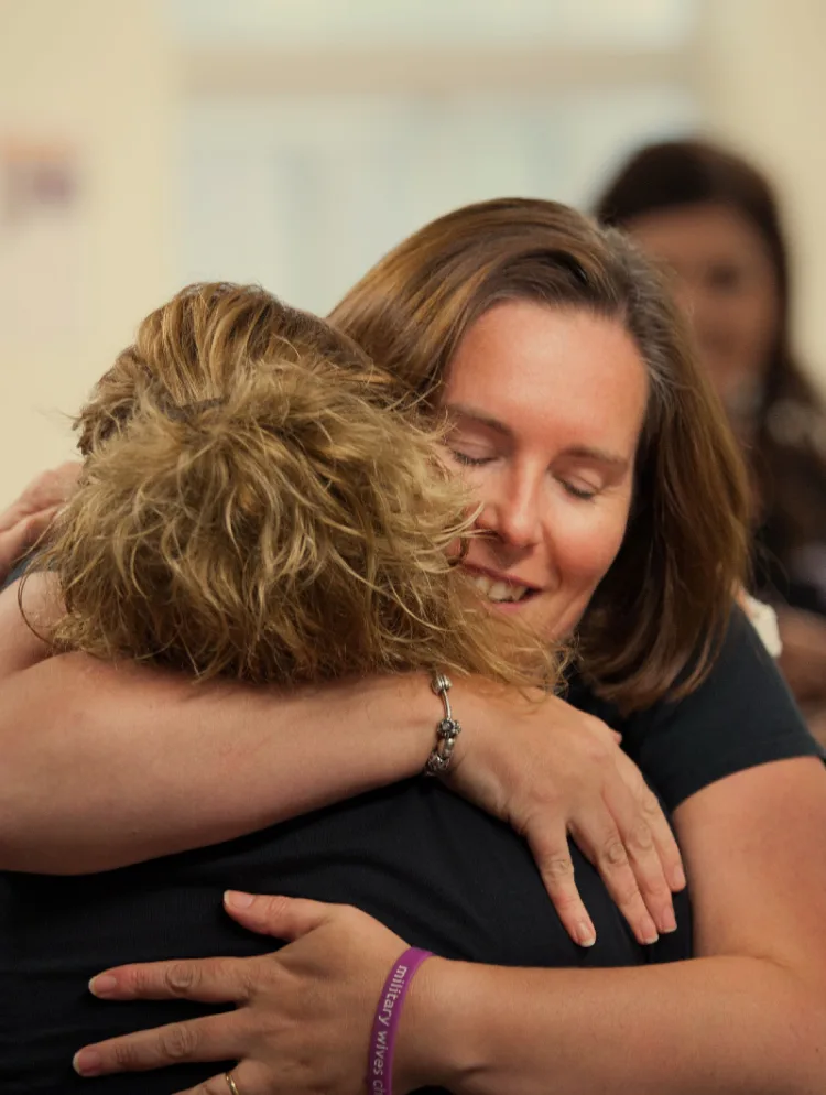 women hugging